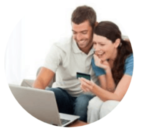 Man and lady looking at a laptop computer
